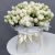 Композиция в шляпной коробке из кустовых пионовидных роз Мисс Бомбастик в Пушкино